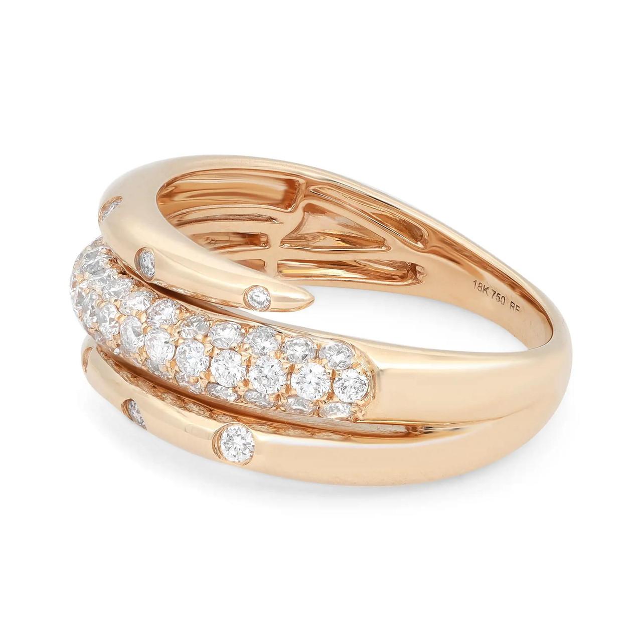 Introducing our stunning 0.78 Carat Diamond Spiral Ring in 18K Yellow Gold. This exquisite piece showcases a captivating spiral design crafted in 18K rose gold, adorned with a sparkling pavé of diamonds at the face. The combination of the intricate