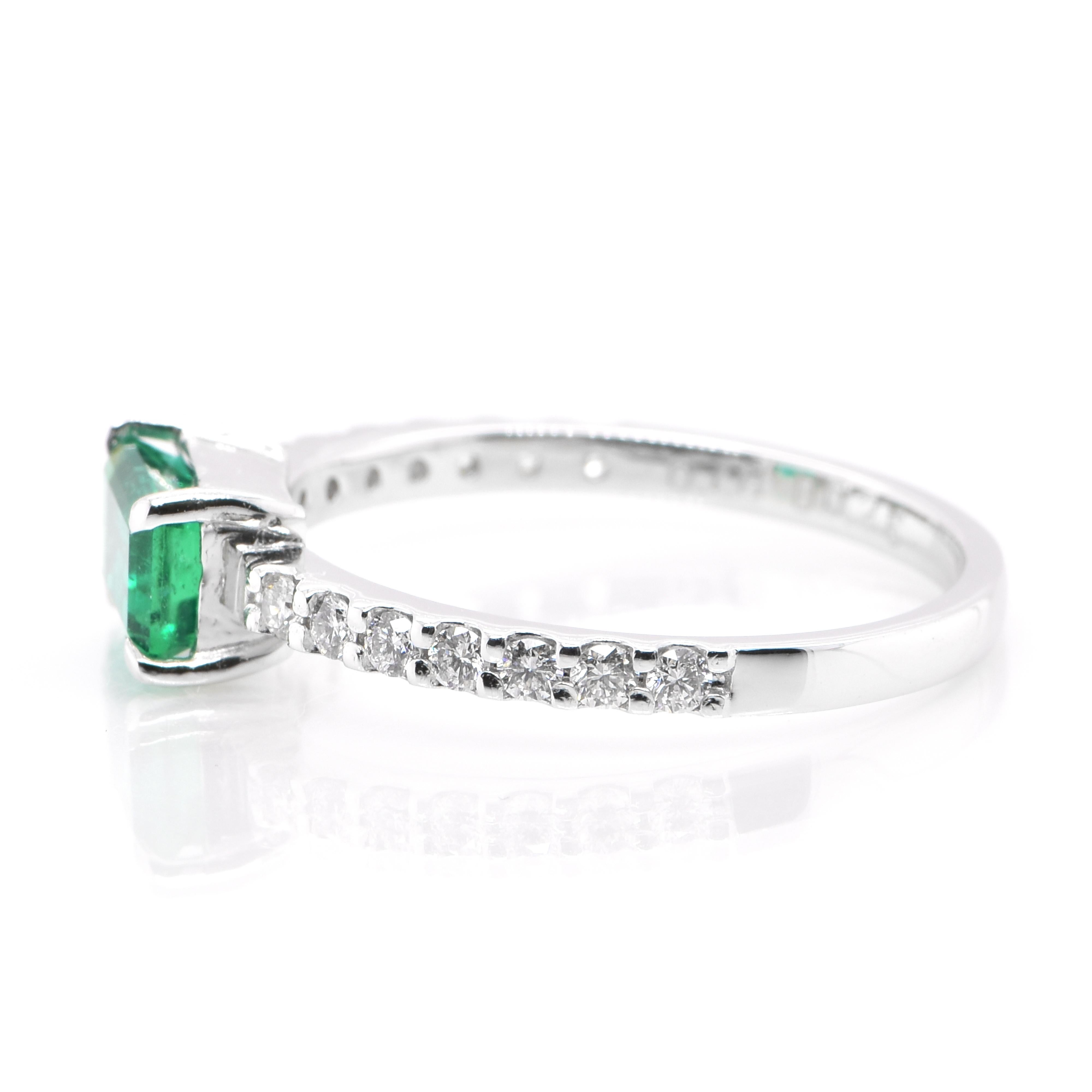Emerald Cut 0.78 Carat, Natural, Emerald and Diamond Engagement Ring Set in Platinum