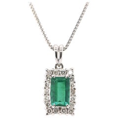 0.78 Carat Natural Emerald and Diamond Pendant Set in Platinum