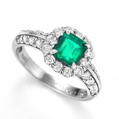 0.78 Carat Natural, Vivid Green Emerald & Diamond Ring made in Platinum