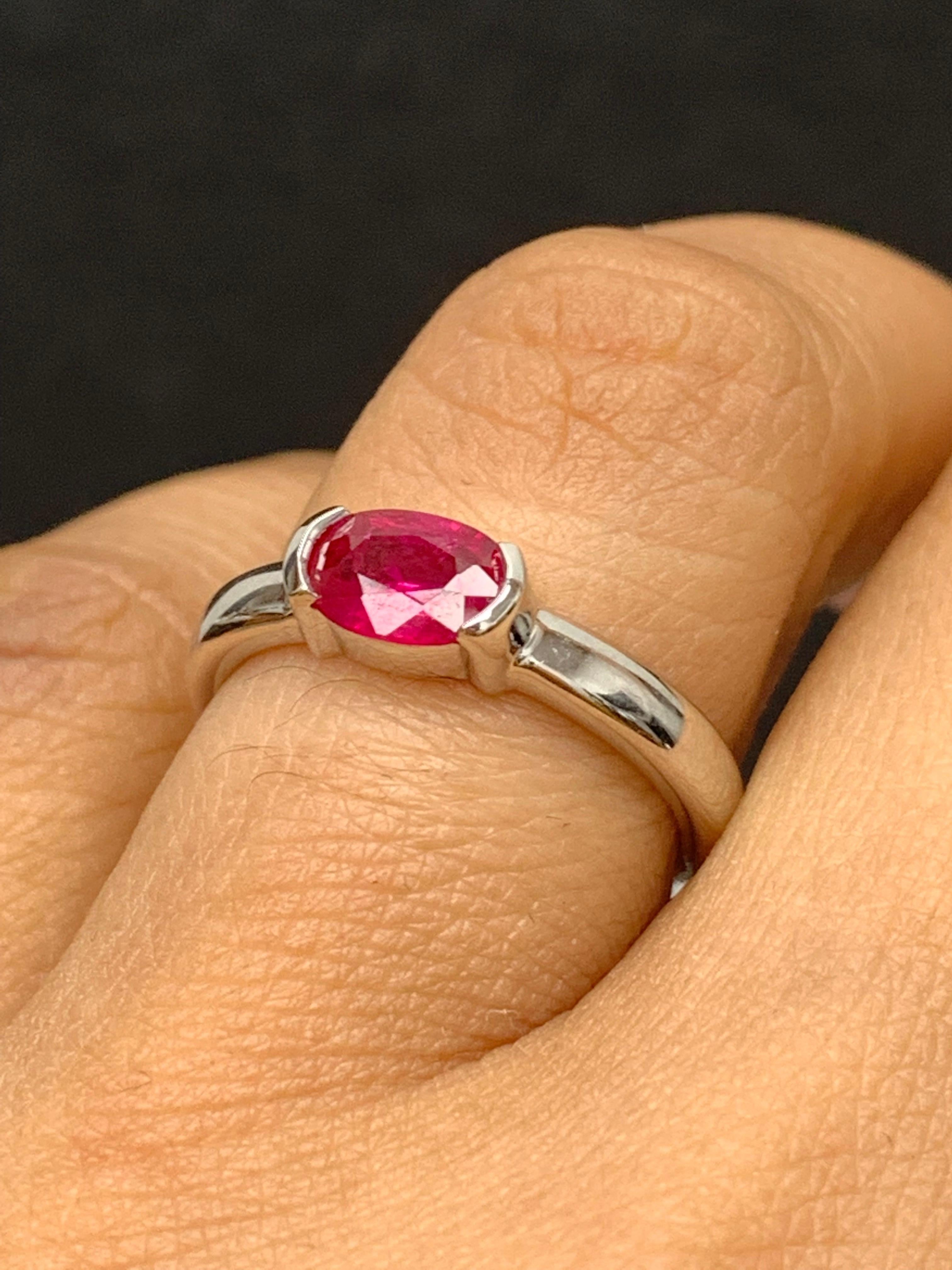 Modern 0.78 Carat Oval Cut Ruby Band Ring in 14K White Gold For Sale