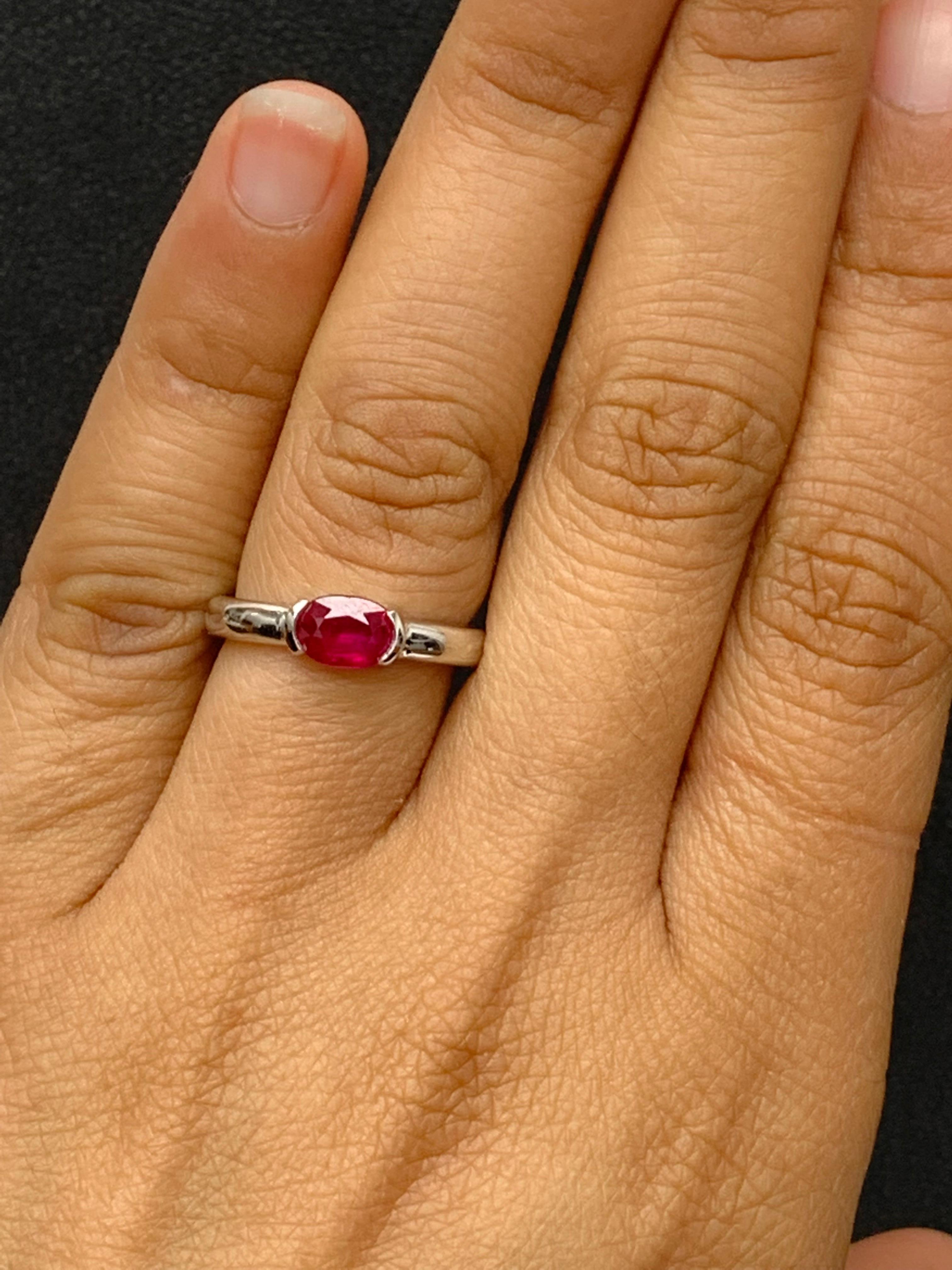 Women's 0.78 Carat Oval Cut Ruby Band Ring in 14K White Gold For Sale