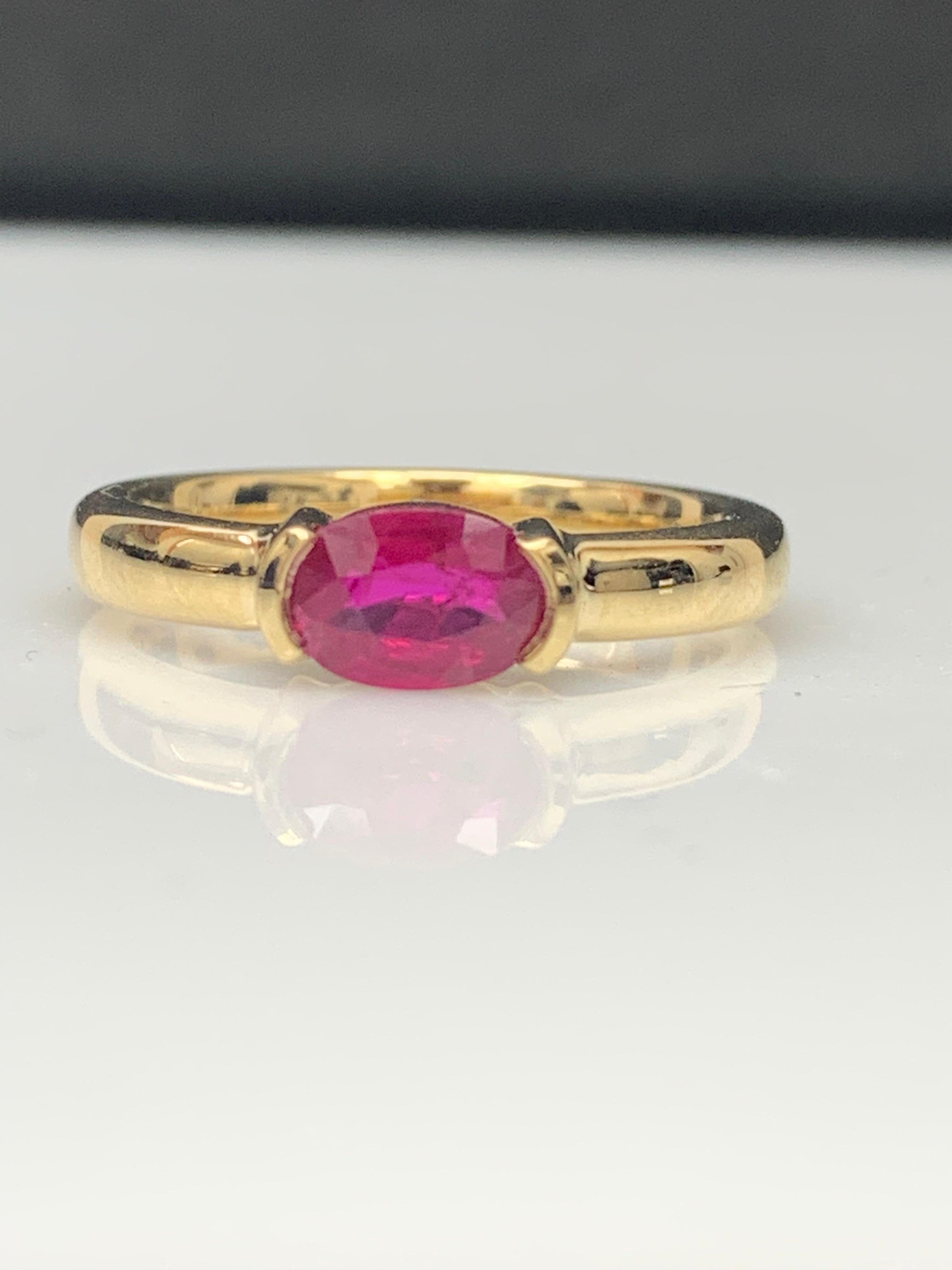 0.78 Carat Oval Cut Ruby Band Ring in 14K Yellow Gold For Sale 5