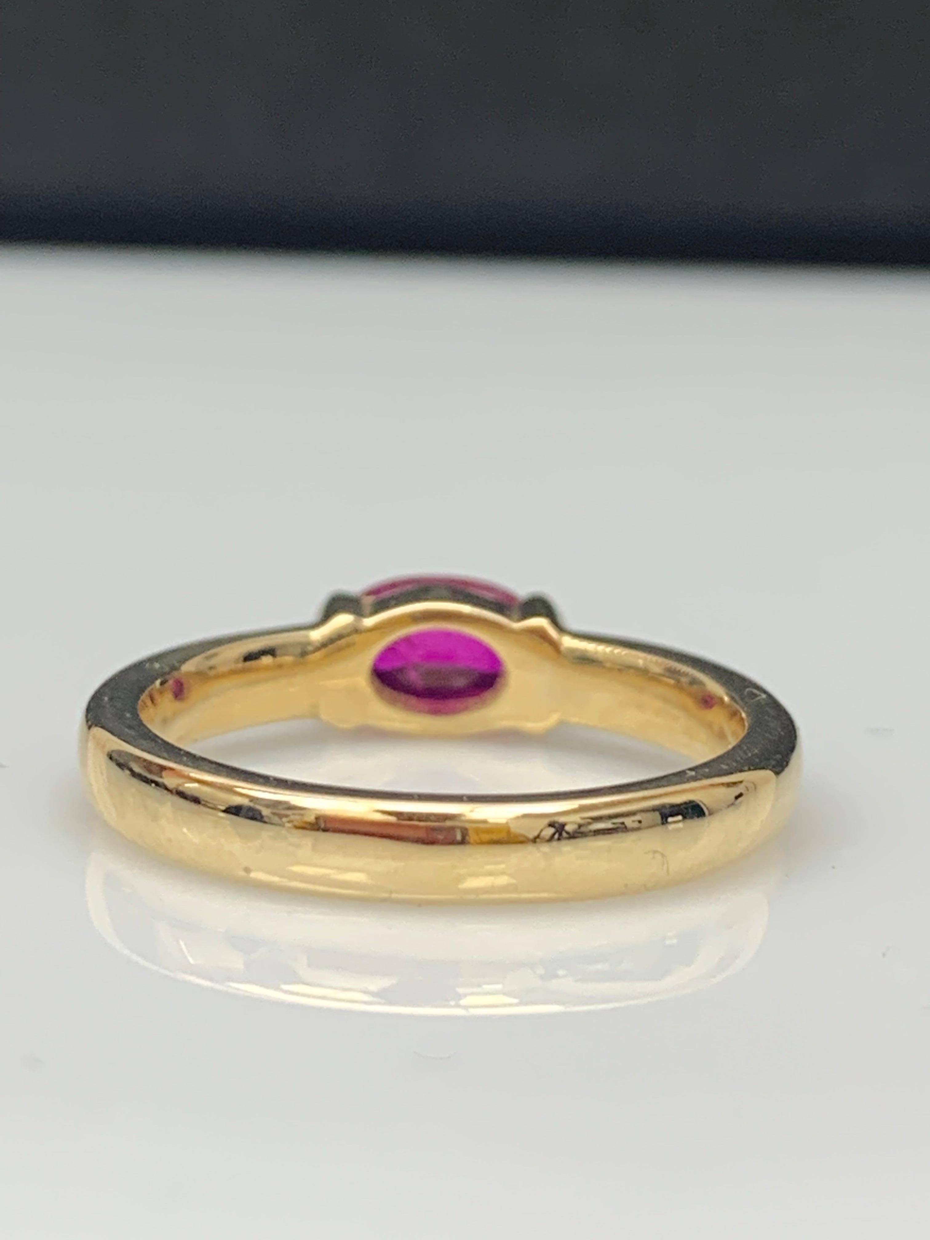 0.78 Carat Oval Cut Ruby Band Ring in 14K Yellow Gold For Sale 7