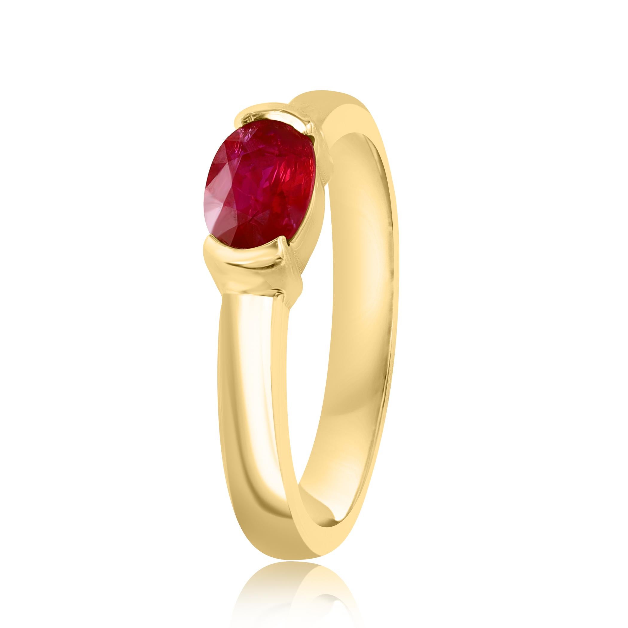 Modern 0.78 Carat Oval Cut Ruby Band Ring in 14K Yellow Gold For Sale