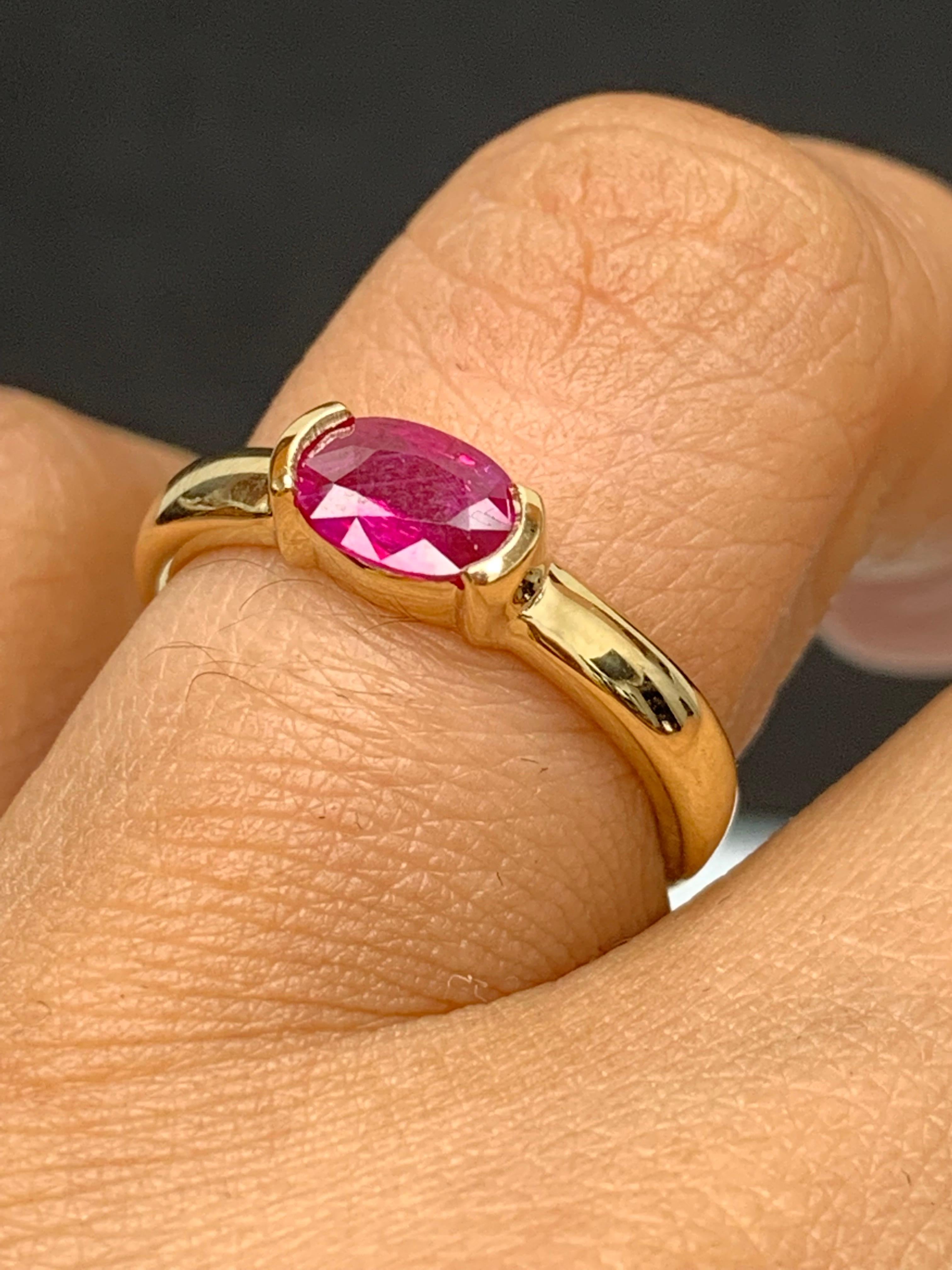 0.78 Carat Oval Cut Ruby Band Ring in 14K Yellow Gold For Sale 1