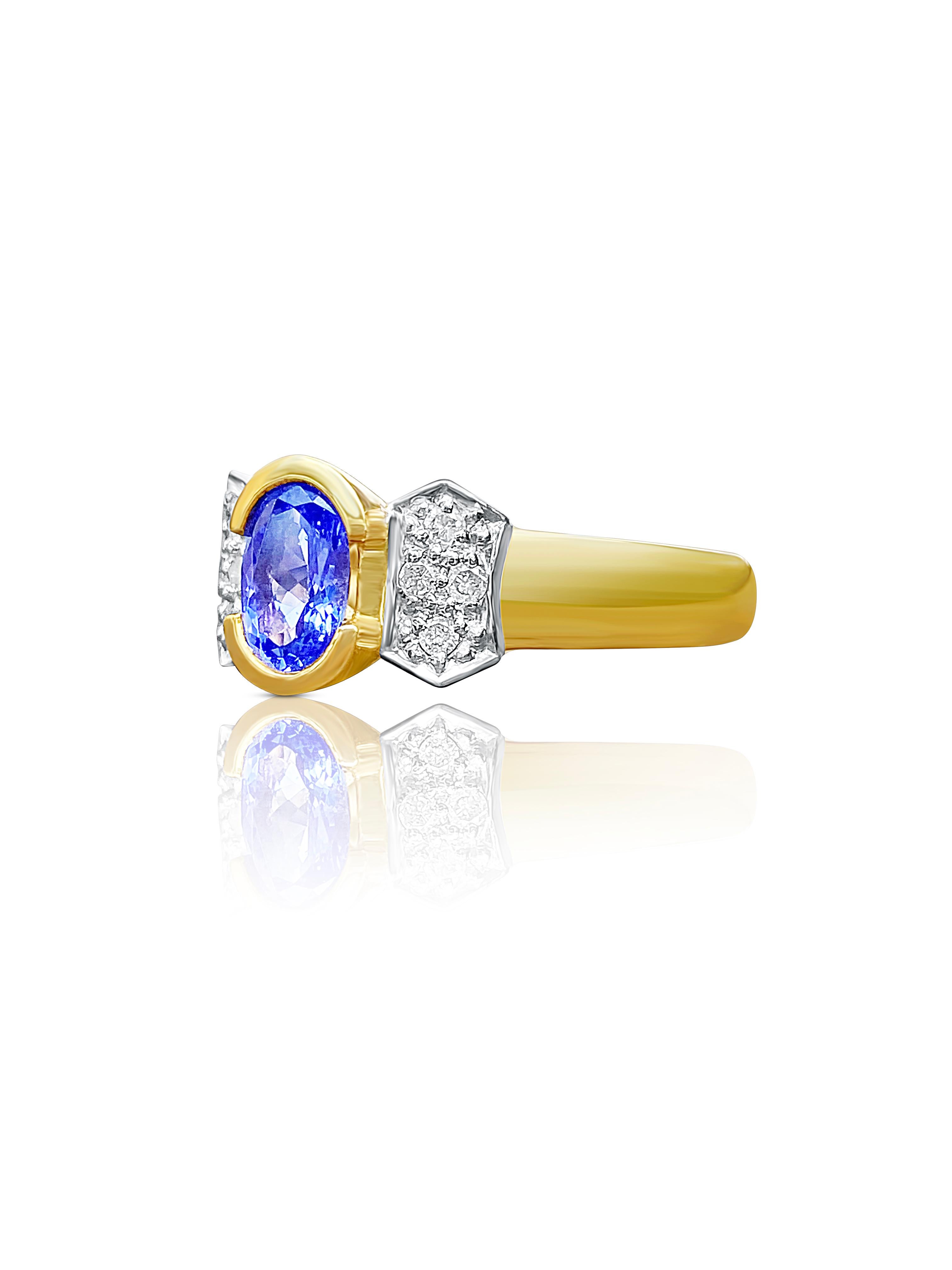 Centering a 0.78 Carat Cornflower Blue Oval-Cut Tanzanite, further accented by Round-Brilliant Cut Diamonds, and set in 14K Yellow Gold, this Vintage Ring is a must for Tanzanite connoisseurs. 

Details:
✔ Stone: Tanzanite
✔ Center-Stone Weight: