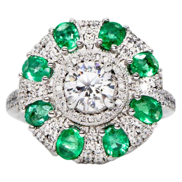 Diamond and emerald cluster ring, 2020