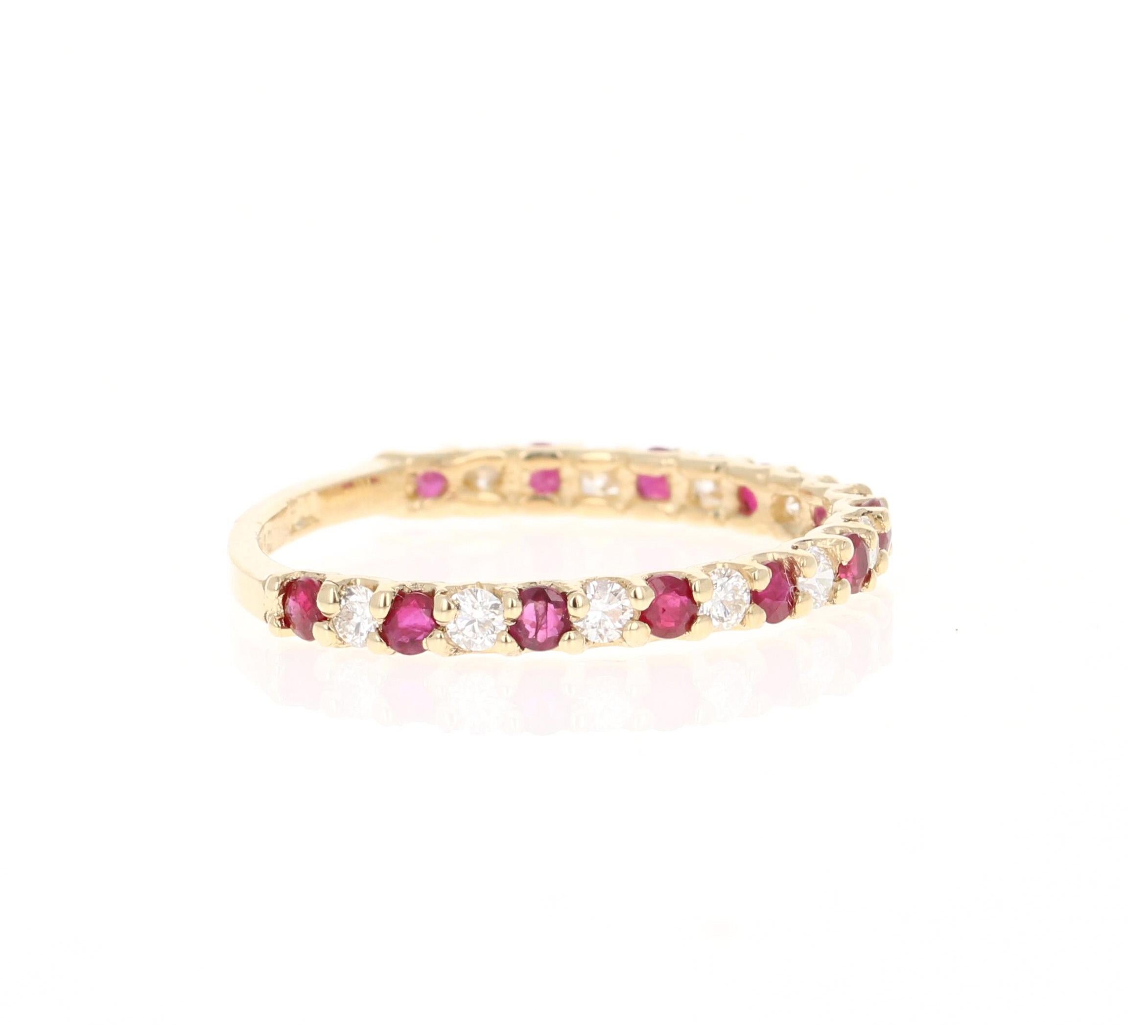 This is a classic band that is a must-have
It has 12 Rubies that weigh 0.50 Carats and 11 Round Cut Diamonds that weigh 0.28 Carats. (Clarity: SI, Color: F) The Total Carat Weight of the Band is 0.78 Carats
It is made in 14K Yellow Gold and weighs