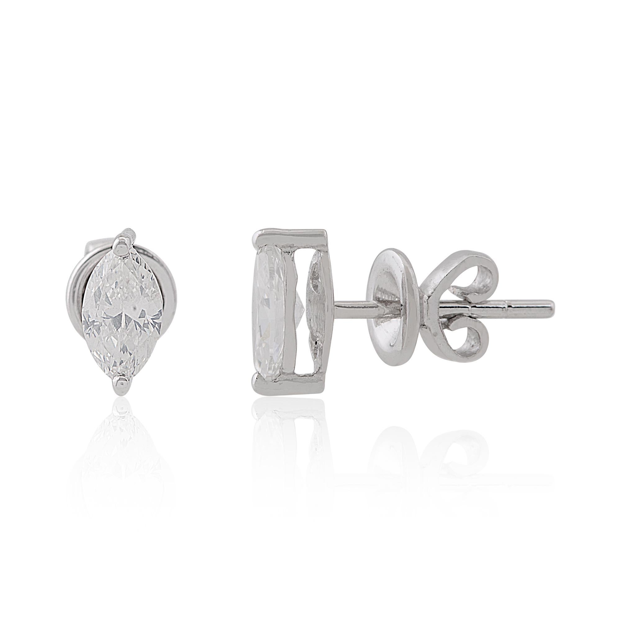 Each earring features a stunning marquise-cut diamond, meticulously selected for its exceptional clarity and brilliance. The marquise cut, with its elongated shape and gracefully tapered points, exudes a sense of grace and sophistication, while the