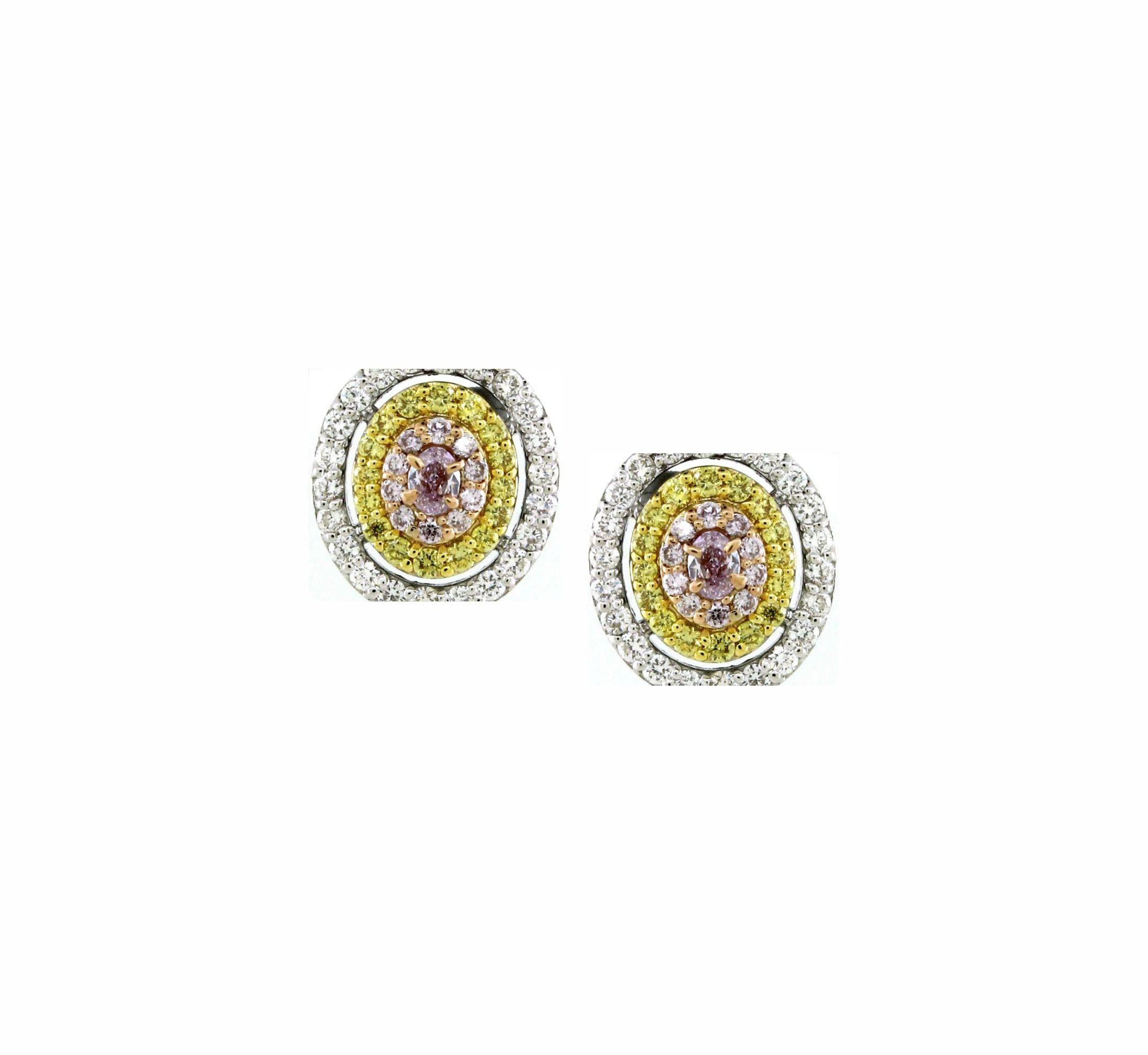 Oval Cut 0.78 cts of Fancy Color Diamond Stud Earrings For Sale