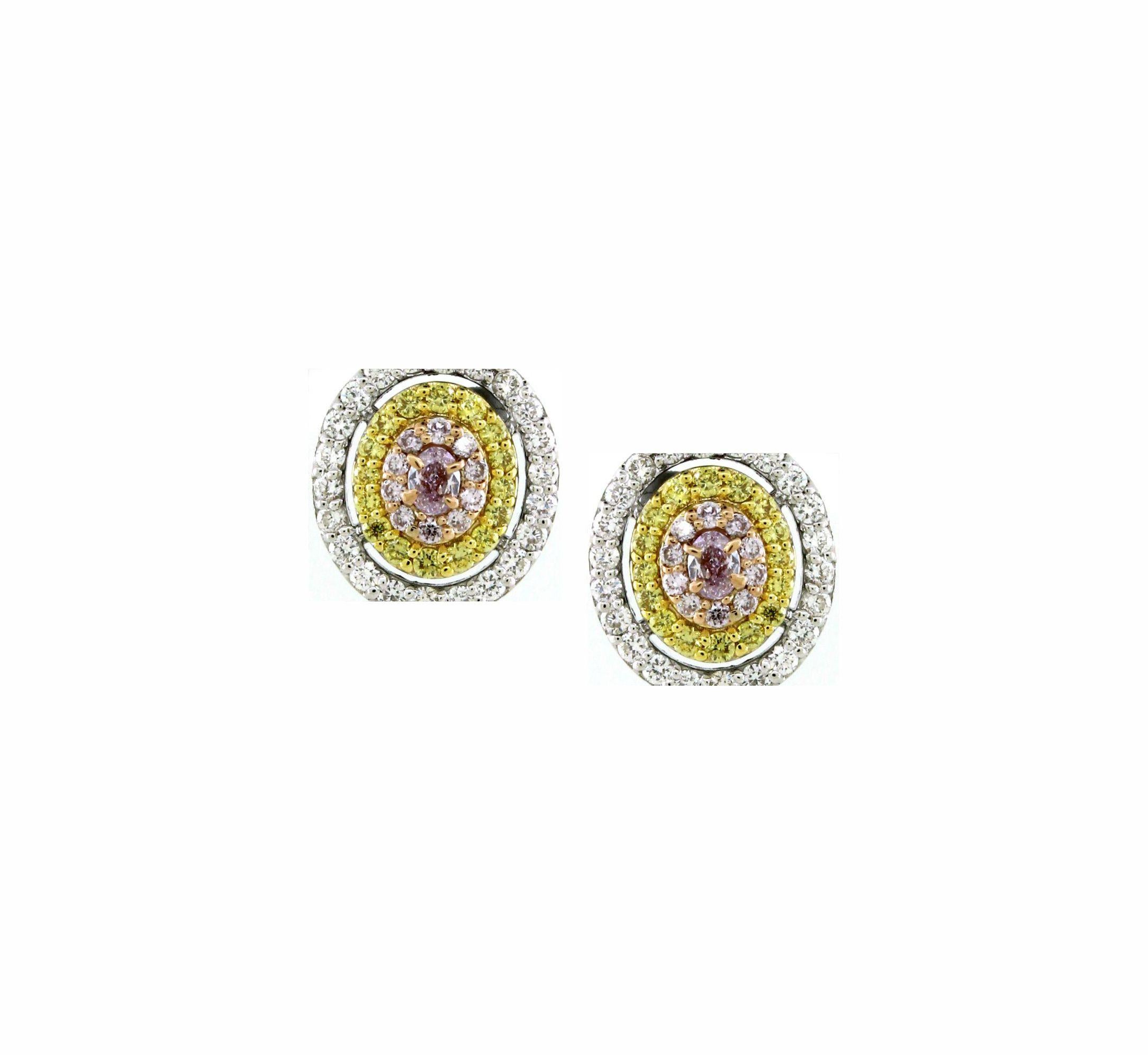 Taille ovale Clous d'oreilles de diamants de couleur fantaisie 0,78 carat en vente