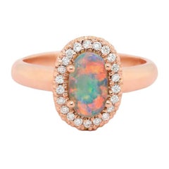 0.78ct Black Crystal Opal 
Diamond Halo Ring in 18K Rose Gold