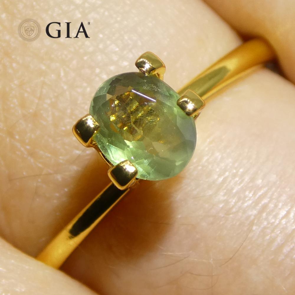 0,78 ct Alejandrita oval de color verde amarillento a púrpura grisáceo certificada por la GIA India Un Corte oval en venta