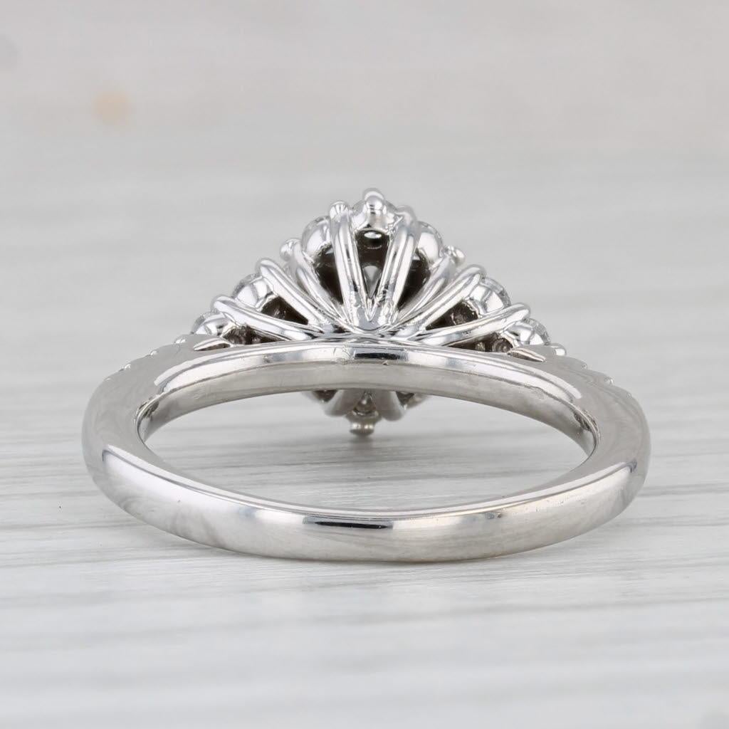 Gemstone Information:
- Natural Diamond -
Carats - 0.31ct 
Cut - Oval Brilliant
Color - F
Clarity - SI1
Laser Inscribed - 144619-89 

- Natural Diamonds -
Total Carats - 0.22ctw
Cut - Round Brilliant
Color - G - H
Clarity - SI1 - SI2

- Natural