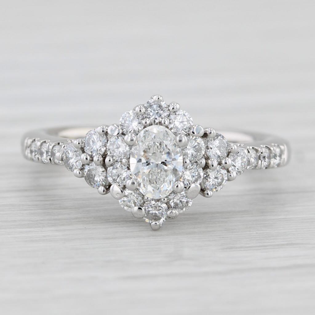 0.78ctw Oval Diamond Halo Engagement Ring 14k White Gold Size 5.5 In Good Condition In McLeansville, NC