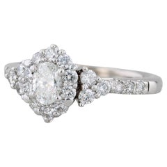 Bague de fiançailles halo de diamants ovales 0,78 ctw en or blanc 14 carats taille 5,5
