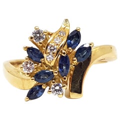 0.79 Carat 18 Karat Yellow Gold Diamond Sapphire Ring