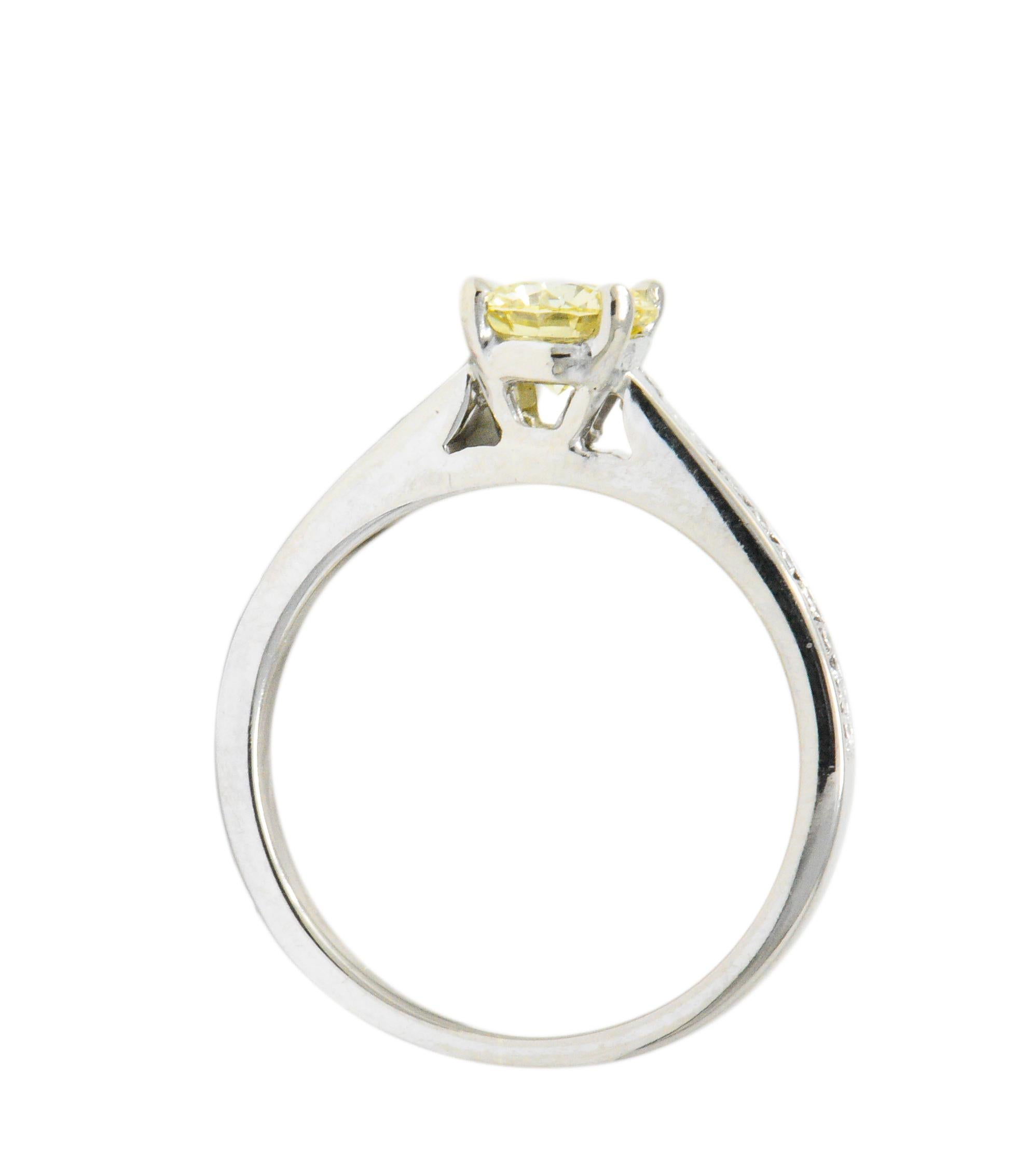 Contemporary Modern 0.79 Carat Fancy Yellow Diamond 14 Karat White Gold Engagement Ring GIA