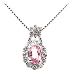 0.79 Carat, Natural Padparadscha Sapphire and Diamond Pendant Set in Platinum