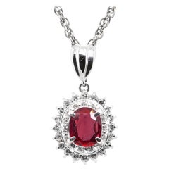 0.79 Carat Natural Ruby and Diamond Pendant Set in Platinum