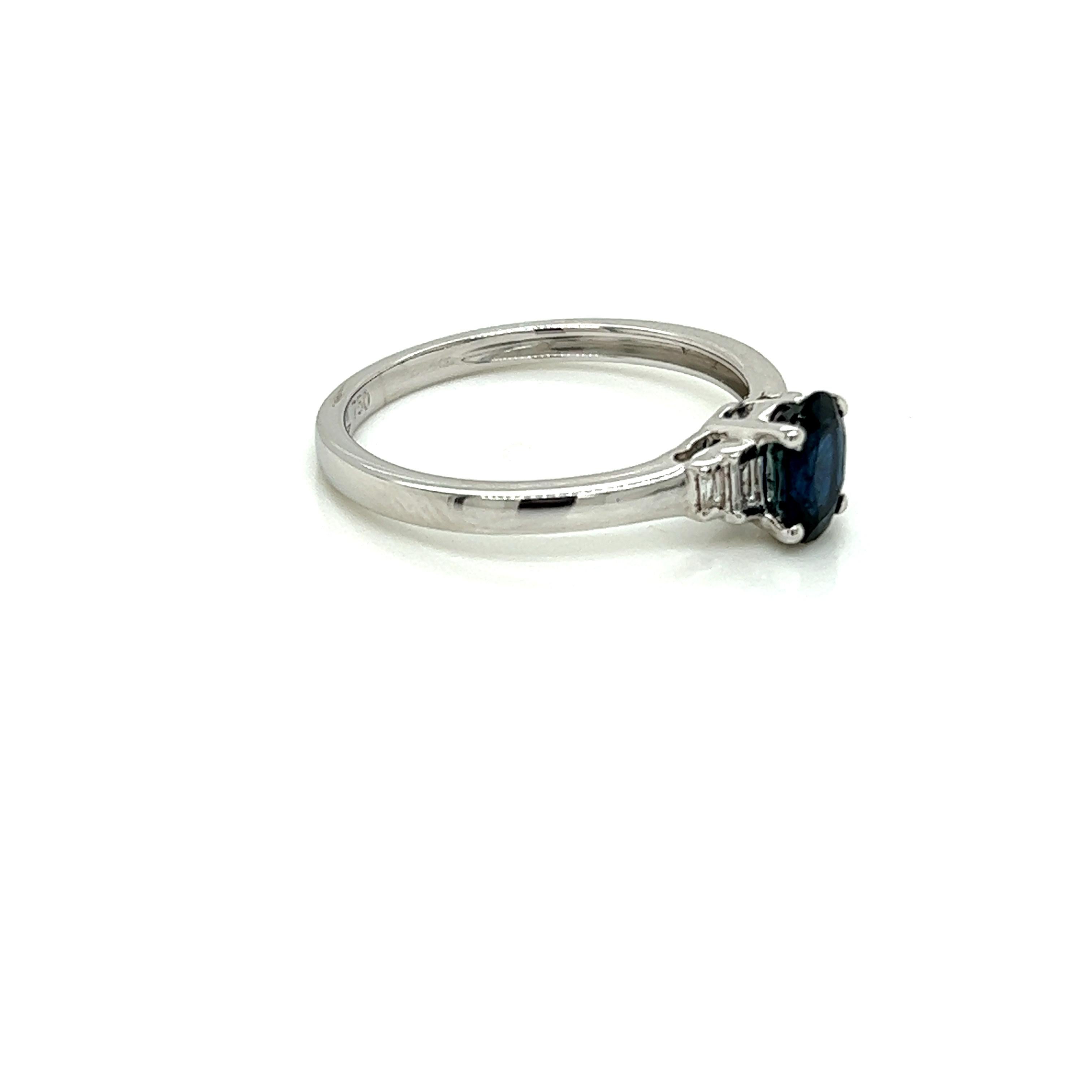 Oval Cut 0.79 Carat Oval cut Blue Sapphire and Diamond Ring in 18K White Gold For Sale