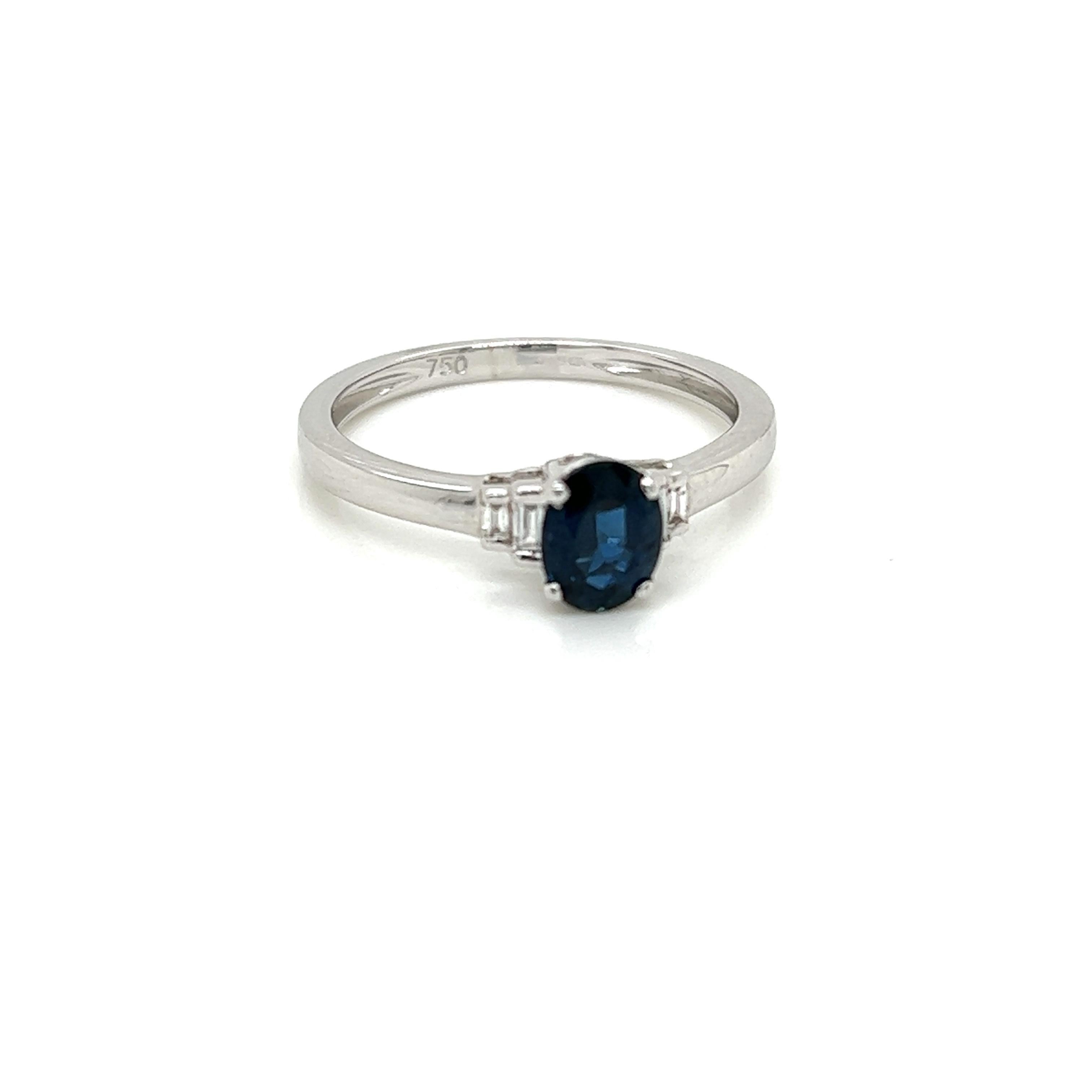 Women's 0.79 Carat Oval cut Blue Sapphire and Diamond Ring in 18K White Gold For Sale