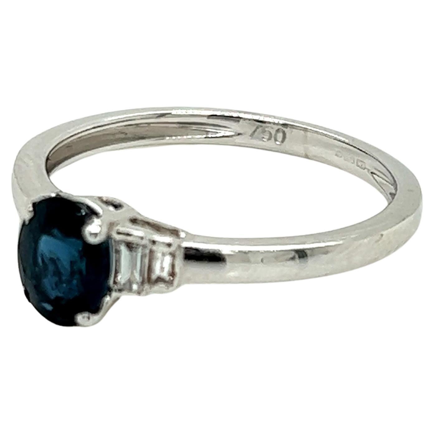 0.79 Carat Oval cut Blue Sapphire and Diamond Ring in 18K White Gold For Sale