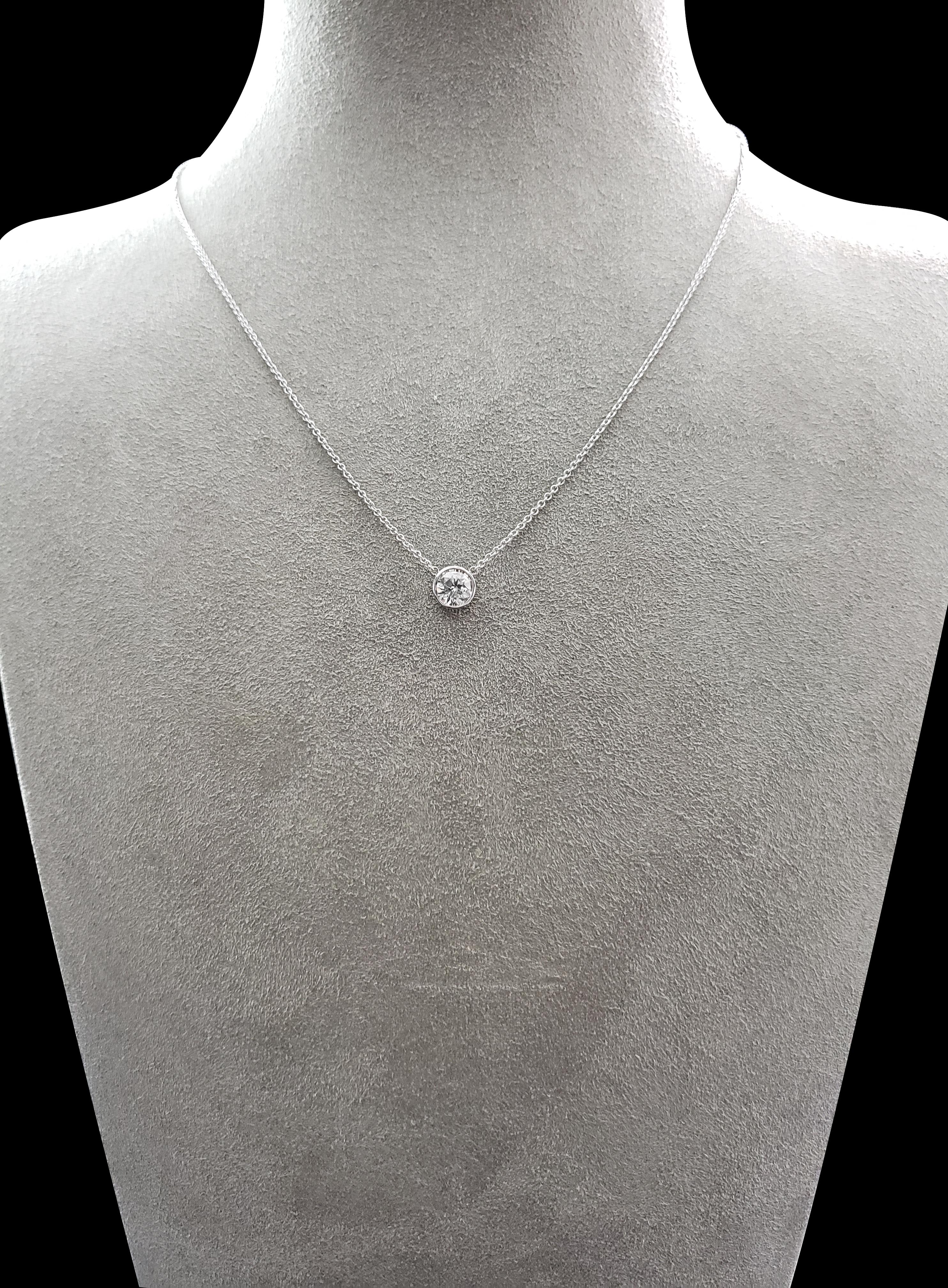 A simple and versatile solitaire pendant necklace, showcasing a 14K white gold bezel-set single round diamond that is attached to a 16 inch white gold chain. 

Roman Malakov is a custom house, specializing in creating anything you can imagine. If