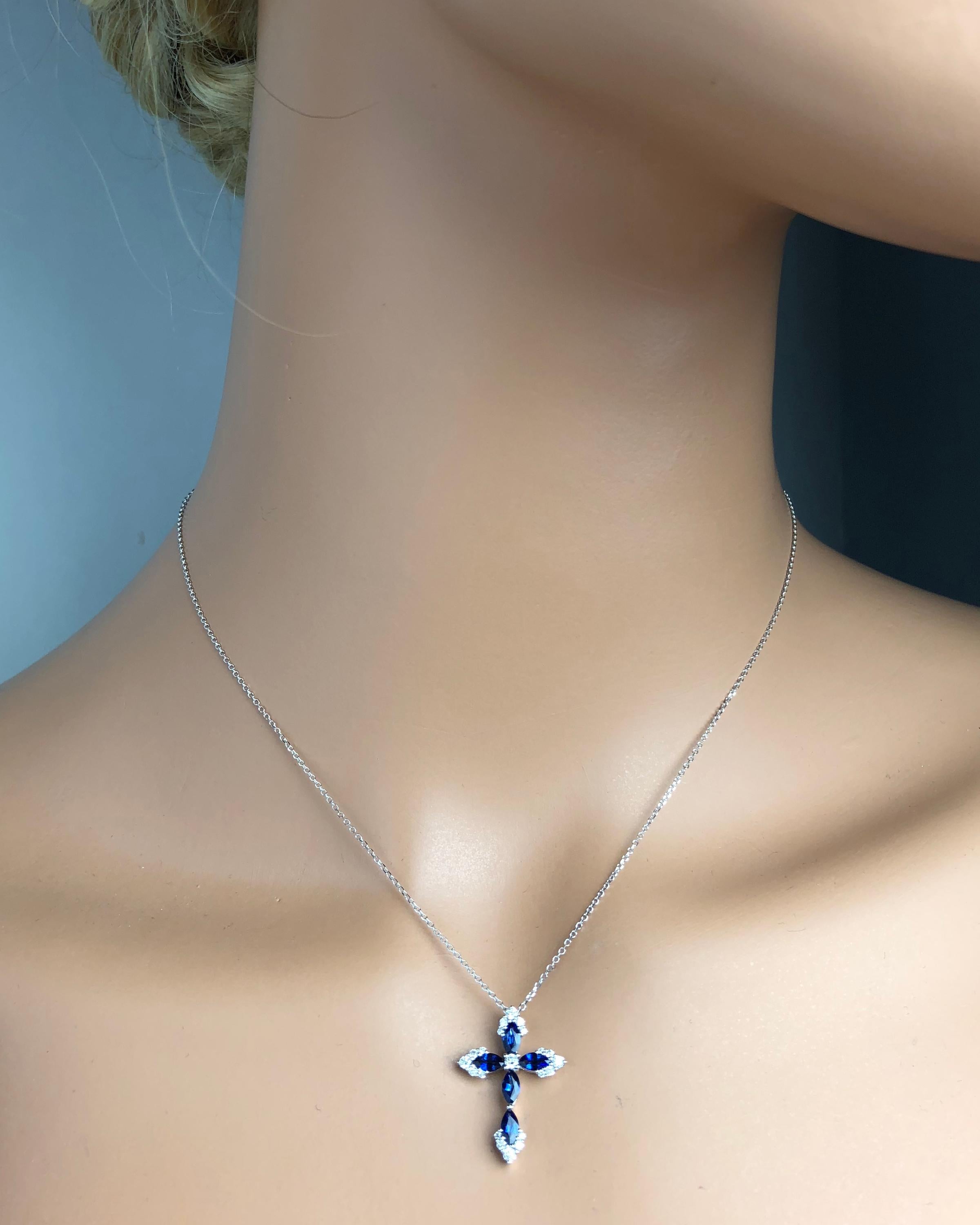 0.79 Carat Vivid Blue Sapphire and 0.23 Carat Diamond Cross Pendant In New Condition In New York, NY