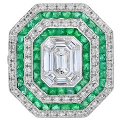 Anello a raggiera con diamante taglio smeraldo in stile Art Deco con incastonatura a illusione in oro 18 carati