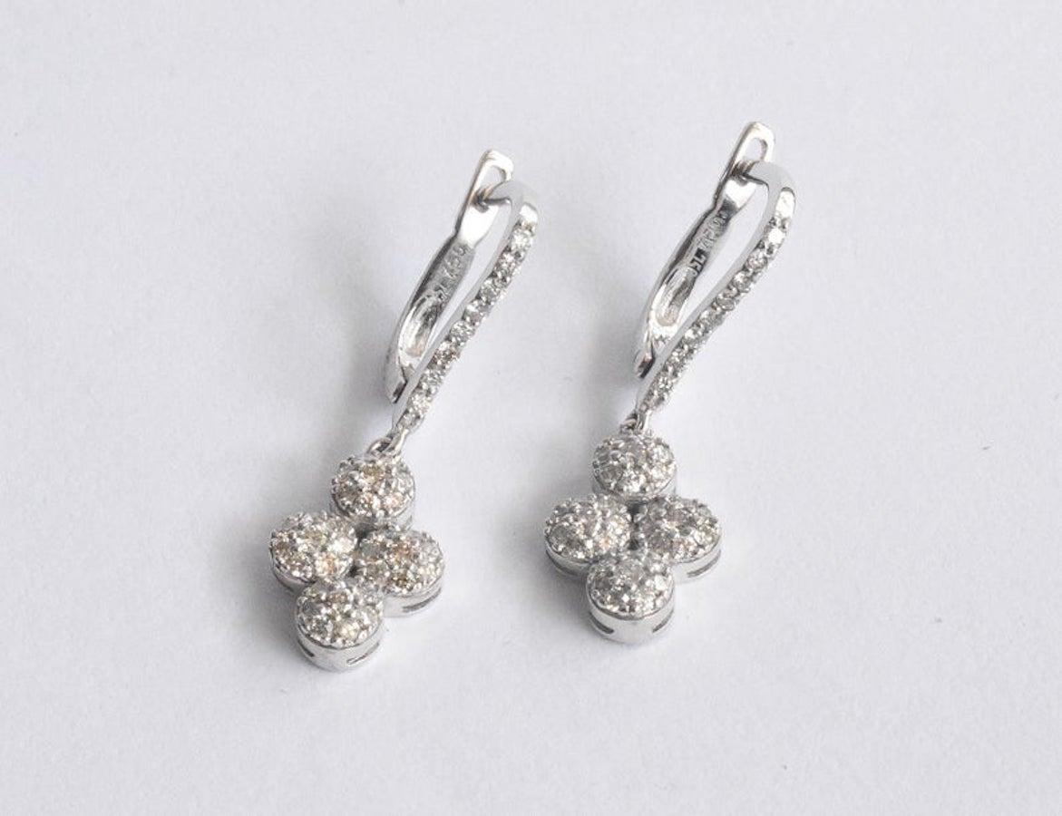 Modern 0.79 CTW Diamond Dangle Earrings in 18 Karat Solid Gold For Sale