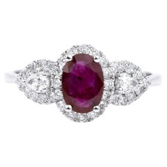 Verlobungsring mit 0,7 Karat rotem Rubin und Diamant im Baguette-Ring mit Rundschliff