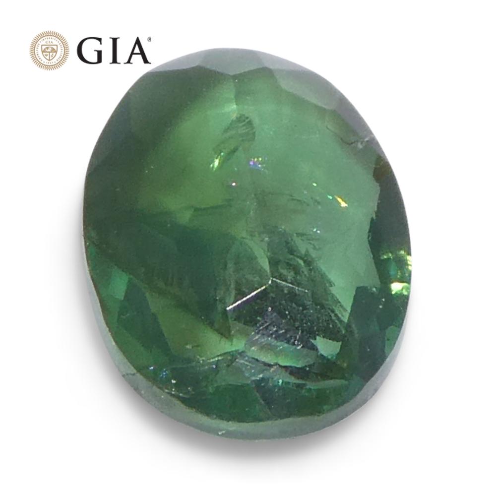 0,7 ct Alejandrita ovalada verde a púrpura grisácea certificada por la GIA India sin calentar en venta 8