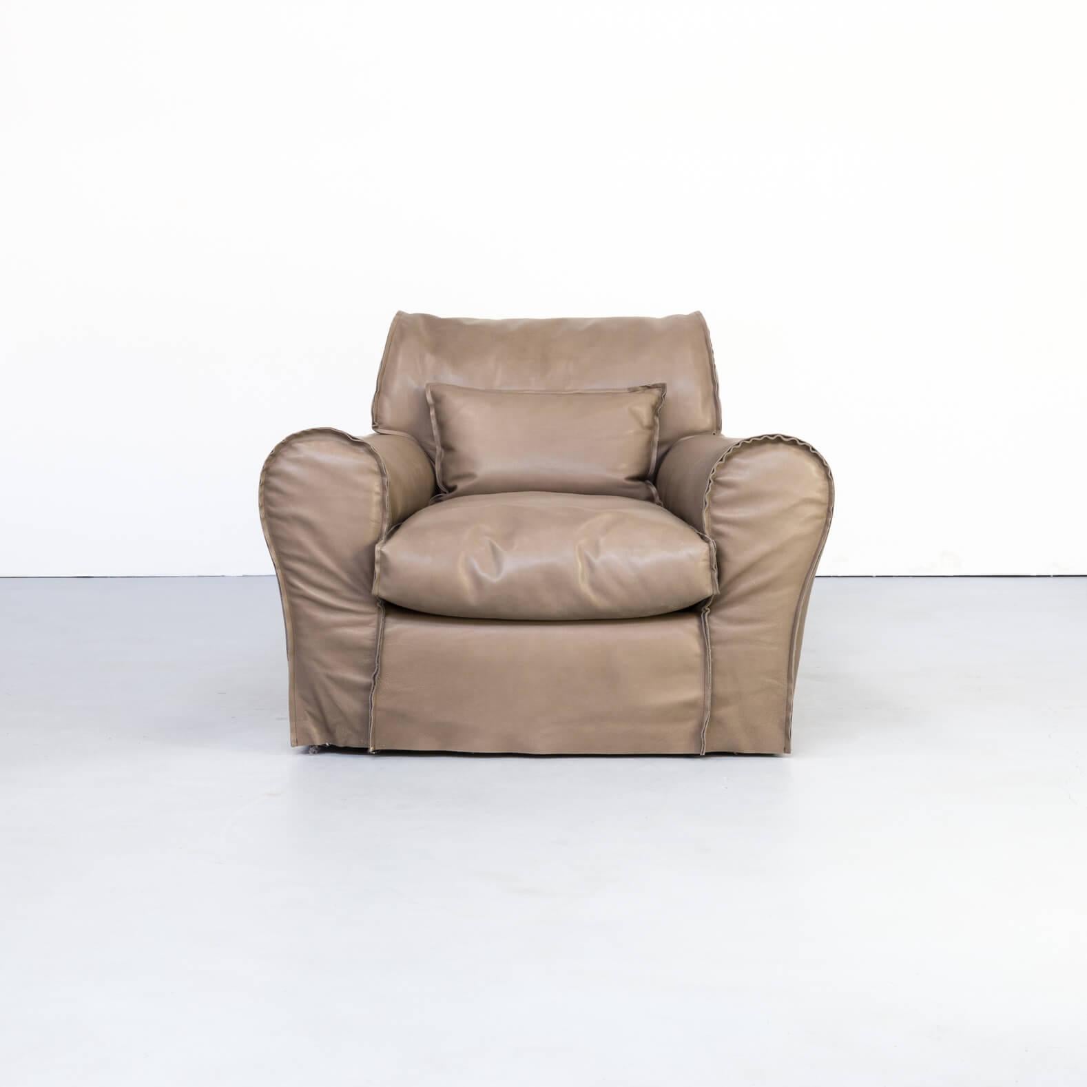 2007 Paola Navone “housse’ fauteuil plume forest leather for Baxter. This model suggests the first true metamorphosis of leather, processed like a fabric. Finished as a fashion accessory, it is presented as a new and versatile material. Housse is a