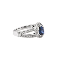 Sunita Nahata Blue Sapphire 0.80ct. Fancy Ring in 14KWG with White Diamond.