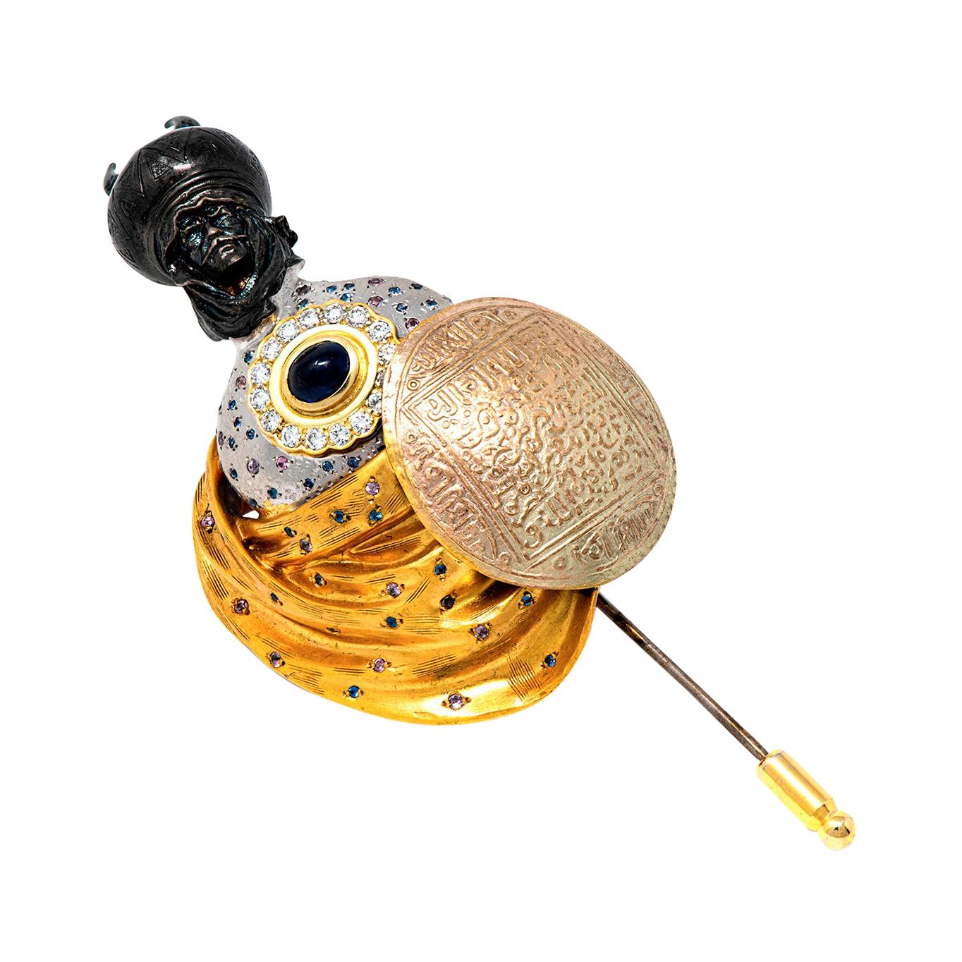 Broche Moretti du 21e siècle en or, rhodium noir, diamants et saphirs 