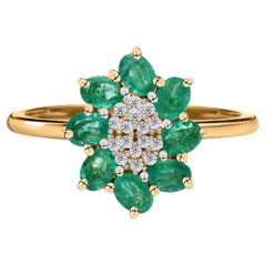 0.8 Carat Oval Zambian Emerald 0.13 Carat SI/H Diamond Ring 14 Karat Yellow Gold