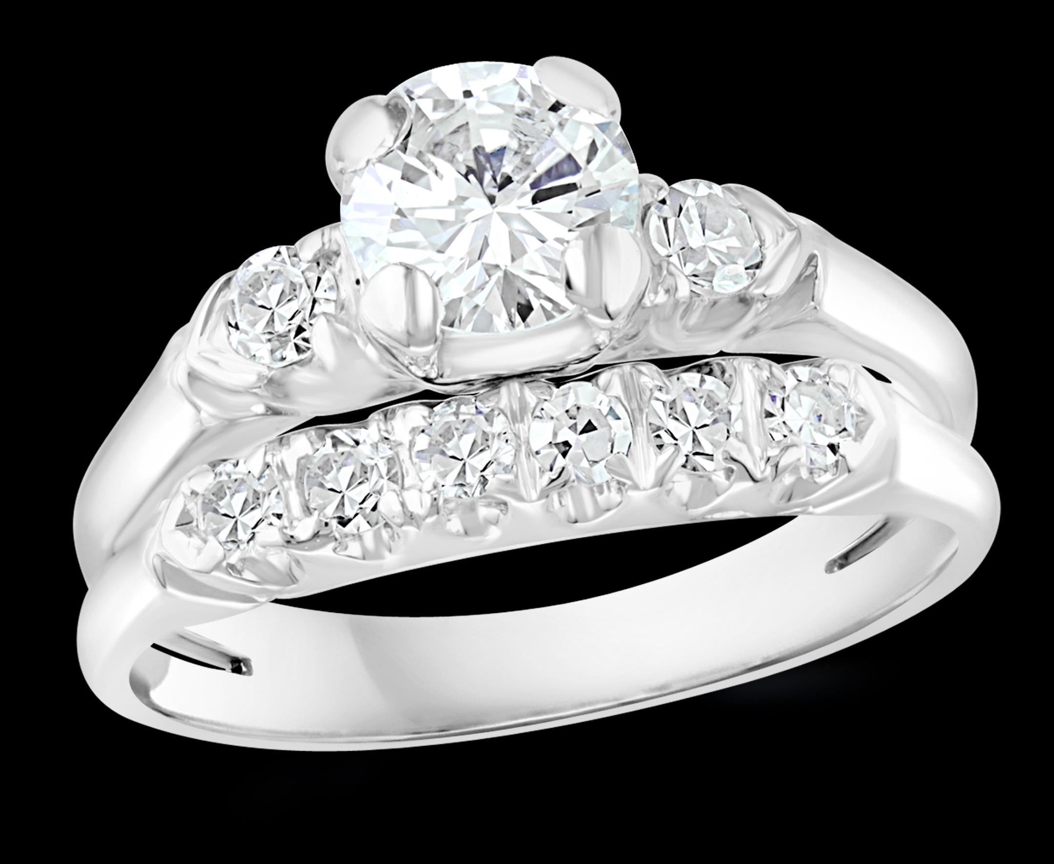 Approximately 0.6 Ct Solitaire Round Center Diamond 14 Kt White Gold Ring & Band
Total Diamond Weight is approximately 1 ct
By Measurements only as we did not take the Center  stone out to weight , 0.6 Carat Solitaire Round Center Diamond Engagement