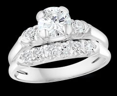 Approximately 0.6 Ct Solitaire Round Center Diamond 14 Kt White Gold Ring & Band