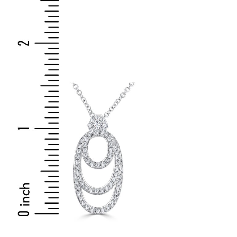 This beautiful pendant has three oval frames of round diamonds, each freely able to dangle against the others. The total diamond weight is 0.80 carats. Set in 14k white gold.
Suggested retail price $9,926

DiamondTown is proud to offer a wide