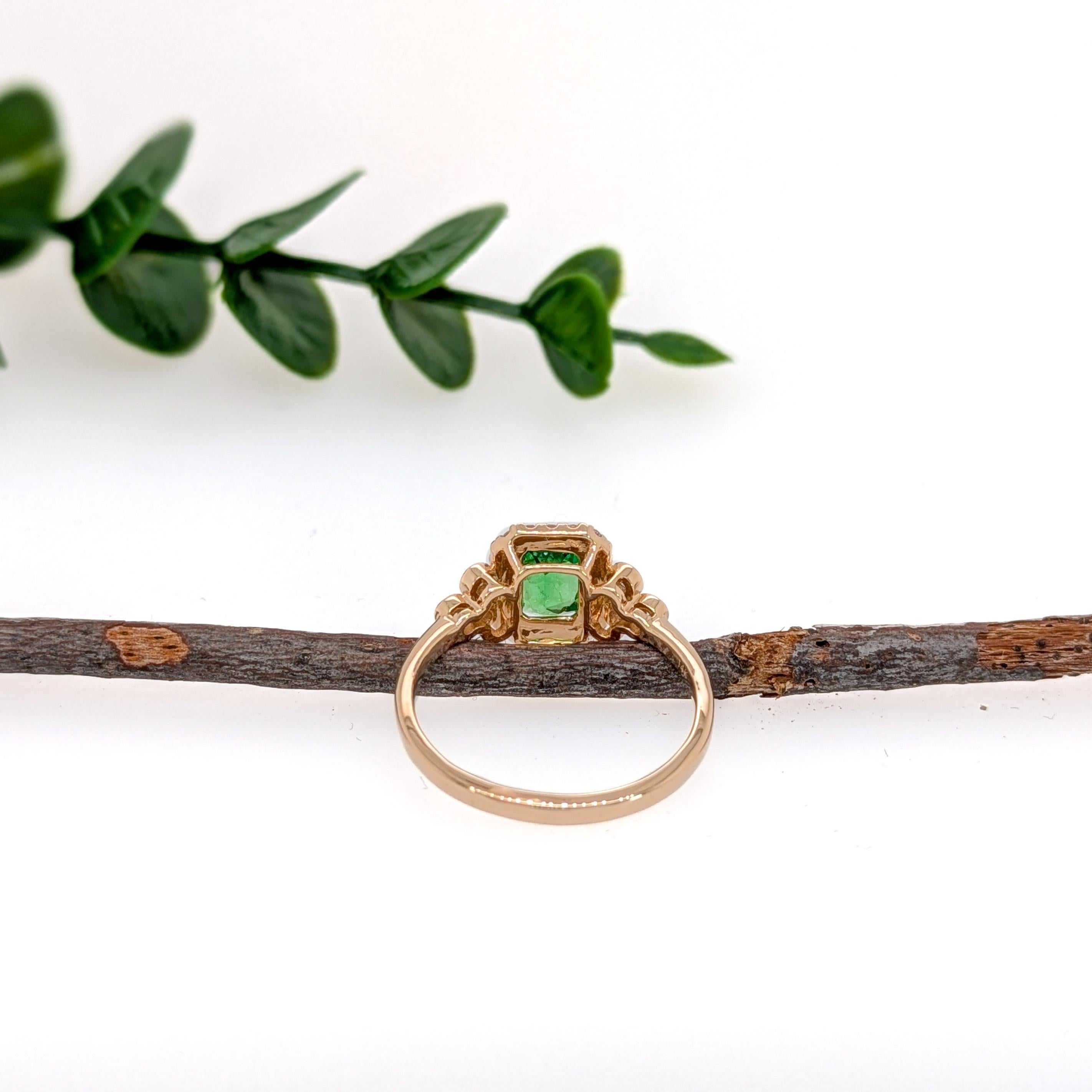 Modern elegance meets timeless charm in this 14K yellow gold ring, showcasing a 0.82 carat Tsavorite Garnet framed by a delicate halo of earth-mined diamonds. A refined piece for everyday luxury.

**We offer complimentary resizing, message us the