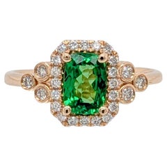 0.8 Carat Tsavorite Garnet Ring with natural Diamond Halo in 14K Gold  CU 7x5mm