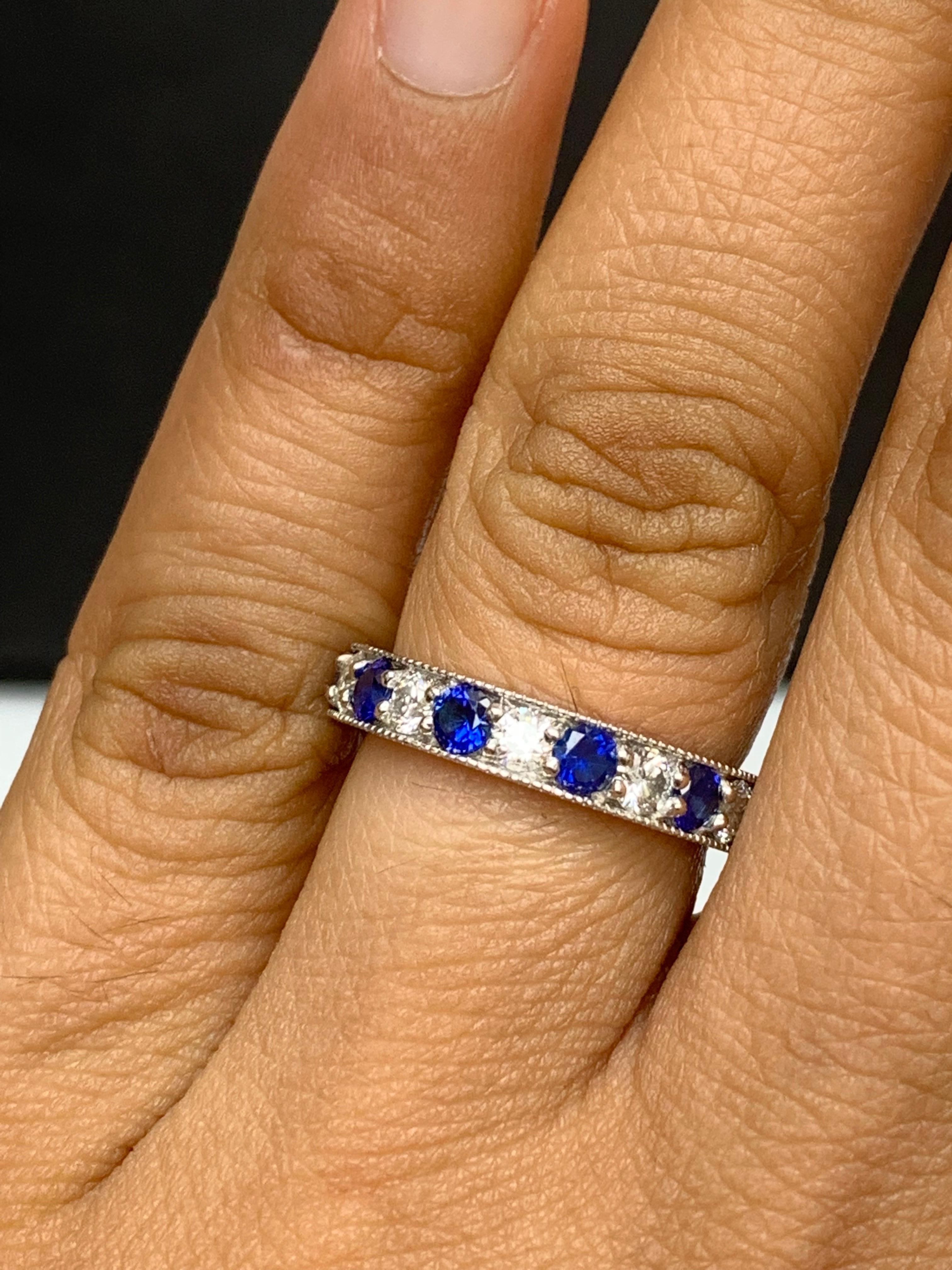 Handcrafted to perfection; showcasing color-rich brilliant-cut blue sapphires that elegantly alternate brilliant-cut diamonds in a 14k white gold setting. 
The 6 Blue Sapphires weigh 0.80 carats total and 5 diamonds weigh 0.50 carats total.

Size