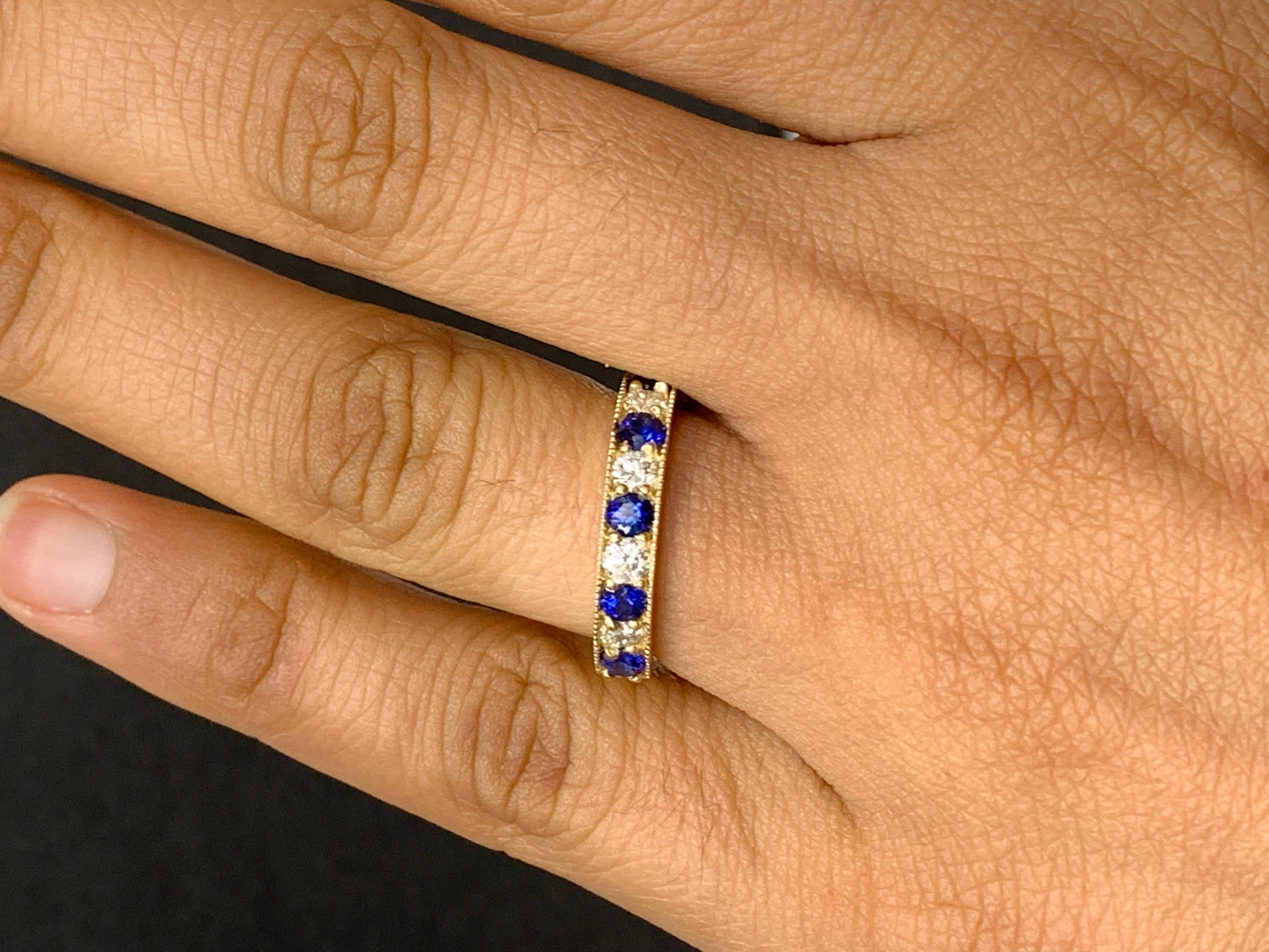Handcrafted to perfection; showcasing color-rich brilliant-cut blue sapphires that elegantly alternate brilliant-cut diamonds in a 14k yellow gold setting. 
The 6 Blue Sapphires weigh 0.80 carats total and 5 diamonds weigh 0.50 carats total.

Size