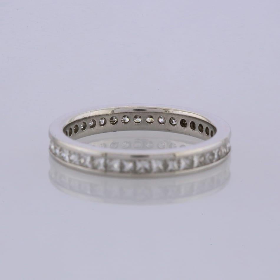 This is a platinum diamond full eternity ring. The ring plays host to 36 channel set princess cut diamonds that cover the whole band of the ring.

Condition: Used (Excellent)
Weight: 4.1 grams
Size: N
Band Width: 3mm
Total Diamond Carat Weight: