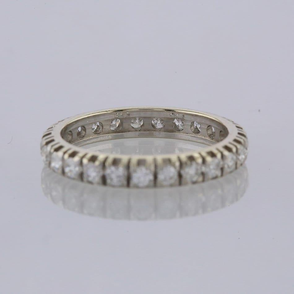 This is an 18ct white gold diamond full eternity ring. The ring plays host to 25 claw set round brilliant cut diamonds.

Condition: Used (Excellent)
Weight: 2.9 grams
Size: N
Band Width: 3mm
Total Diamond Carat Weight: Approx. 0.80 carats
Diamond