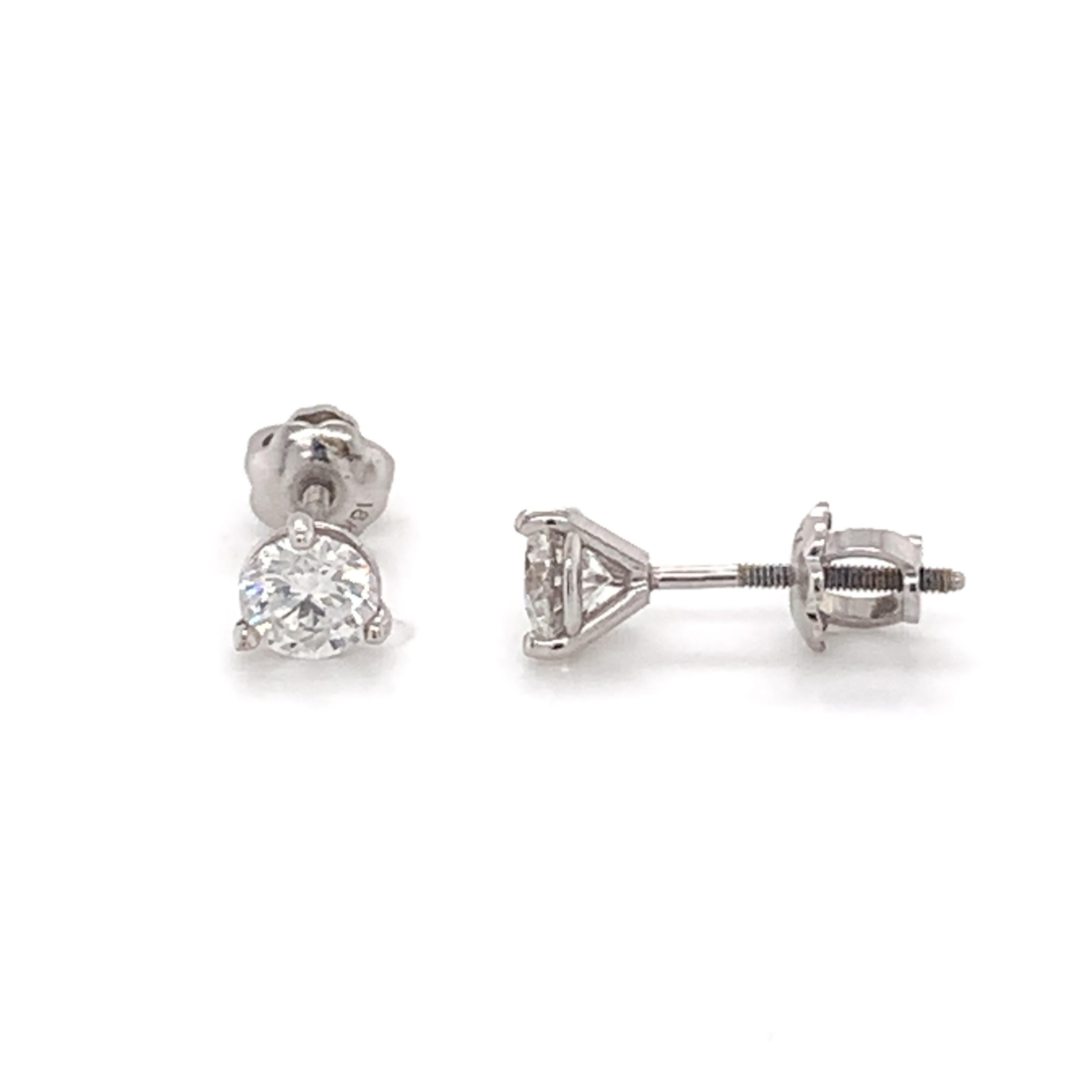 Diamond Stud Earrings made with real/natural brilliant cut diamonds. Total Diamond Weight: 0.80cts. Diamond Quantity: 2 round diamonds. Color: F-G. Clarity: VS2. Mounted on 18kt white gold screw back setting.