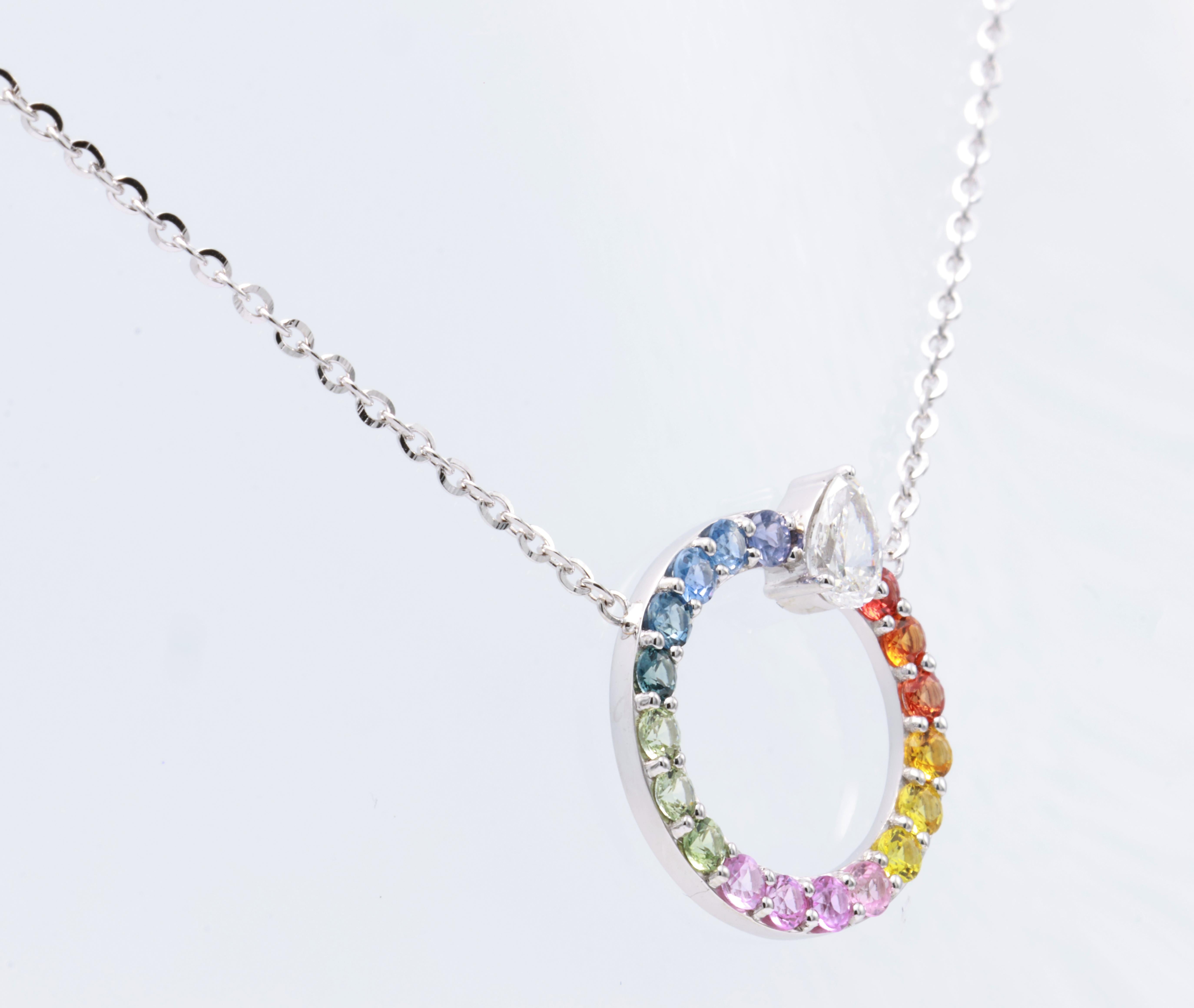 Collana in oro bianco 18kt con diamanti
  
  Colore e caratura dell'oro: Oro bianco 18kt
  Peso: 3.670 grammi
  
  Imposta con...
  Tipo di pietra: Zaffiro
  Forma: Rotondo
  Carati: 0,80 ct
  Colore: Multi colore
  
 
  Pietre circostanti: