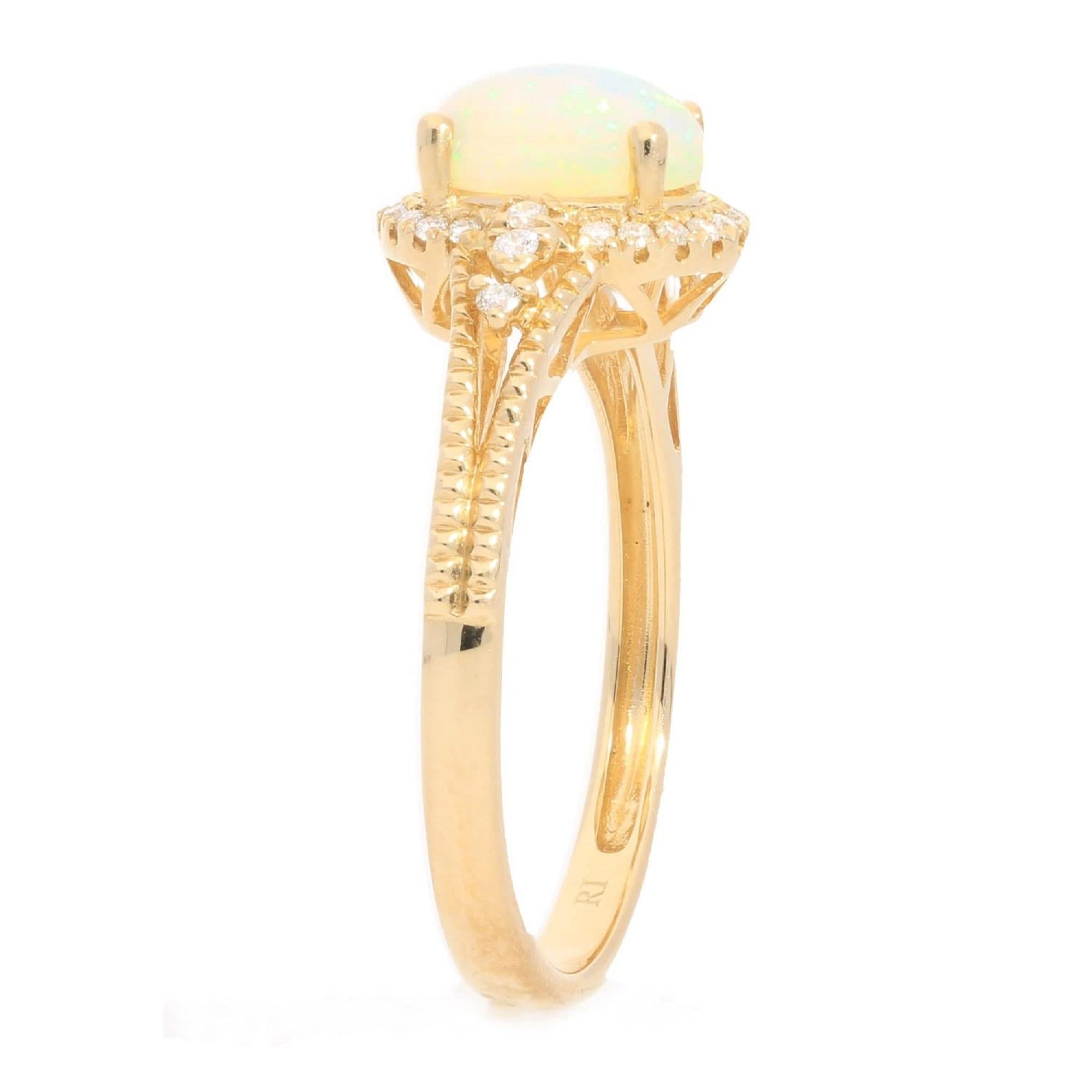 Decorate yourself in elegance with this Ring is crafted from 10-karat Yellow Gold by Gin & Grace Ring. This Ring is made up of 8x6 mm Oval-cab Ethiopian Opal (1Pcs) 0.80 Carat and Round-cut White Diamond (26 Pcs) 0.12 Carat. This Ring is weight 2.49